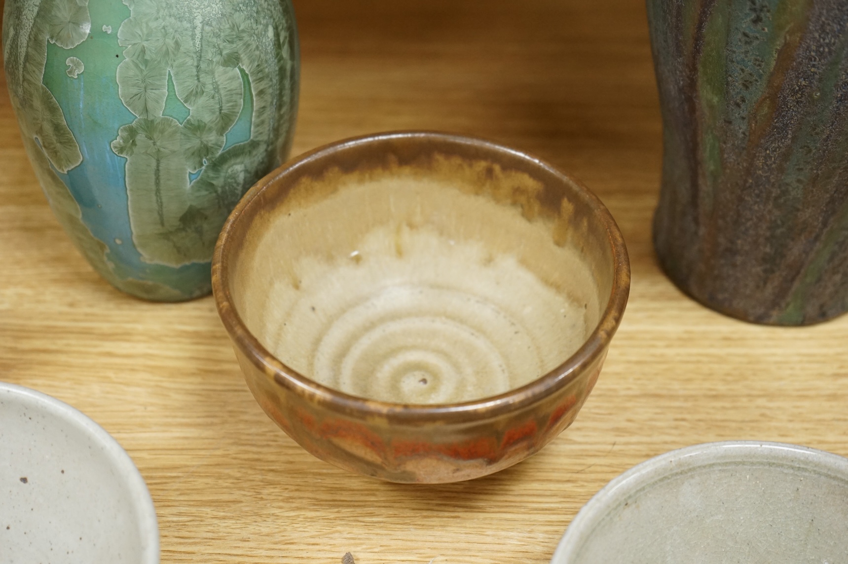 Six pieces of Studio pottery and a vase, largest 32cm high